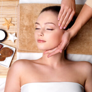 pampering-massage-beautiful-face-young-woman-spa-salon